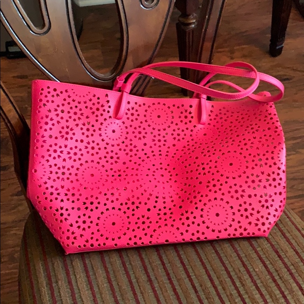 Pink Purse with see through holes